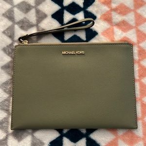 green Michael Kors wristlet